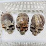 3-pieces-moonstone-mixed-sunstone-skull-carving-wholesale-crystals-576892